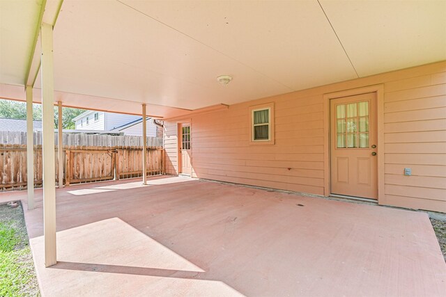 view of patio with fence
