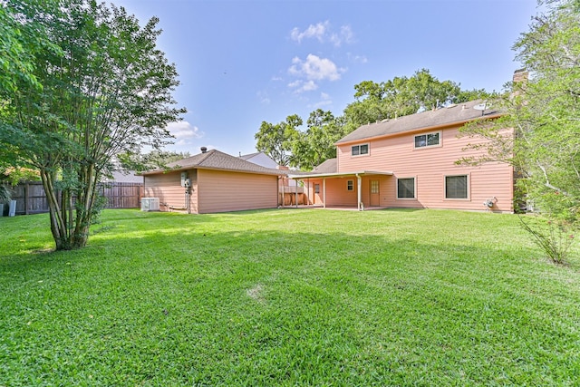 4206 Willow Hill Dr, Seabrook, TX 77586 - rear view of property with fence and a yard