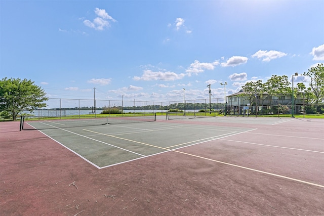 4206 Willow Hill Dr, Seabrook, TX 77586 - view of sport court featuring fence and community basketball court