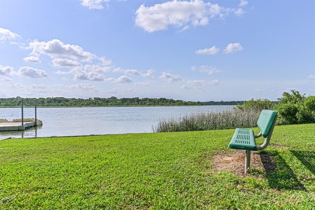 property view of water featuring a boat dock
