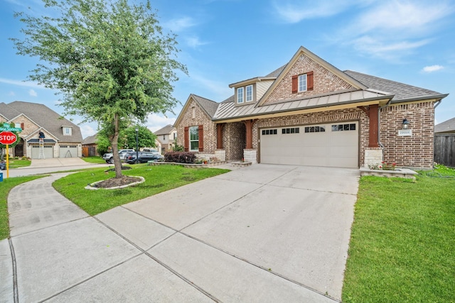 traditional home with brick siding, an attached garage, driveway, and a front yard
