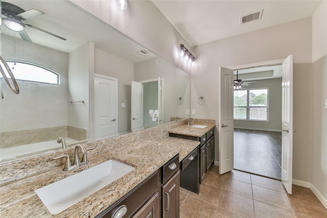 full bathroom with double vanity, visible vents, a sink, and ceiling fan