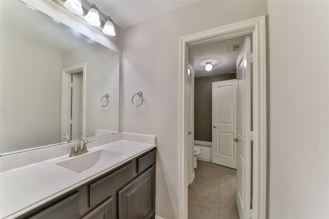 full bathroom with tile patterned flooring, visible vents, toilet, vanity, and tub / shower combination