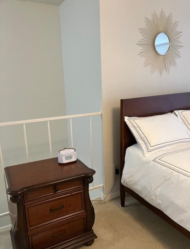 2800 Jeanetta St Unit 2104, Houston, TX 77063 - bedroom with baseboards and light carpet