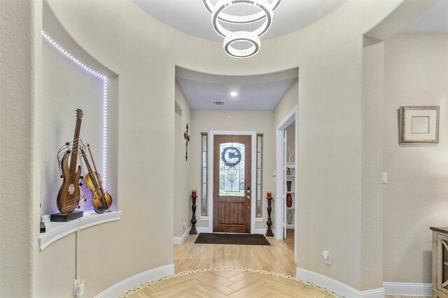 7407 Tudor Heights Ln, Spring, TX 77379 - entrance foyer with baseboards and a chandelier