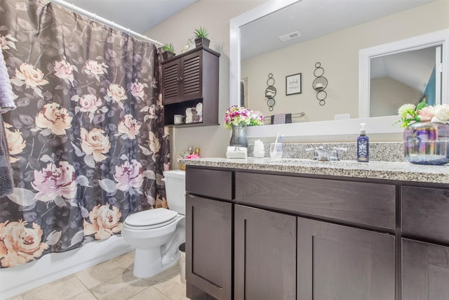 7407 Tudor Heights Ln, Spring, TX 77379 - bathroom featuring toilet, vanity, tile patterned floors, and shower / bath combo