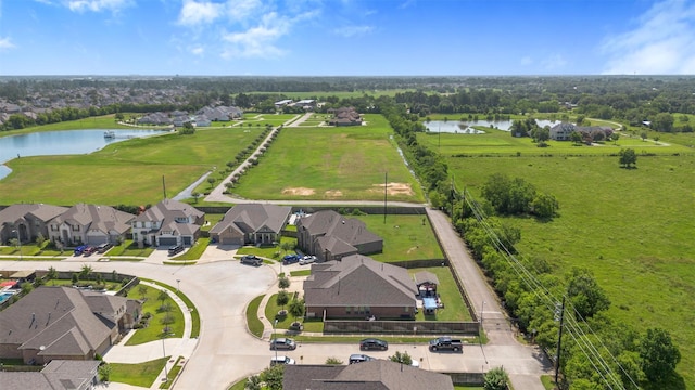 7407 Tudor Heights Ln, Spring, TX 77379 - aerial view of residential area featuring a nearby body of water