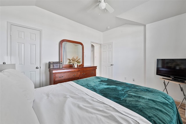 bedroom with ceiling fan and lofted ceiling