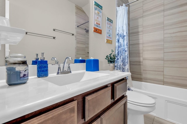 bathroom with shower / bath combo, vanity, and toilet
