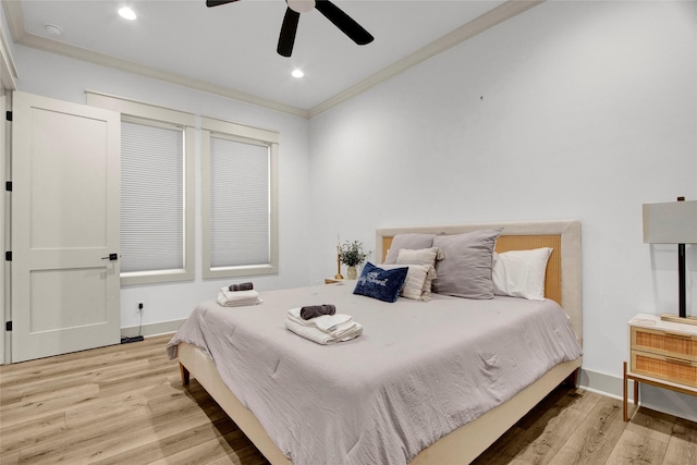bedroom with recessed lighting, wood finished floors, baseboards, and ornamental molding