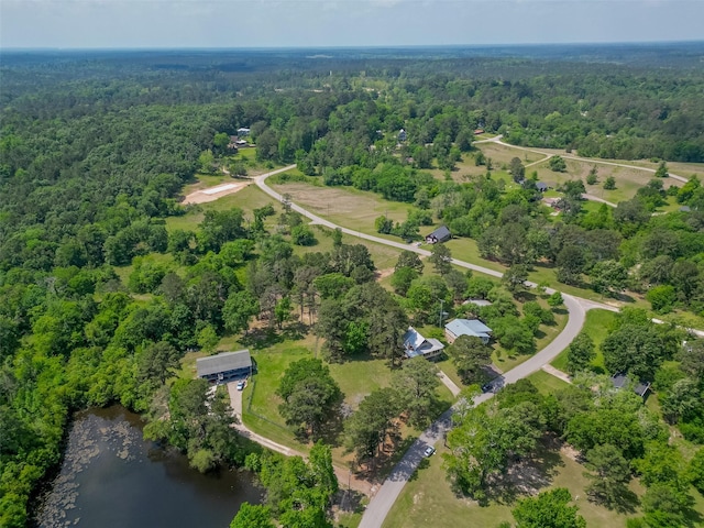 aerial view with a view of trees and a water view