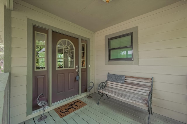 entrance to property with a porch
