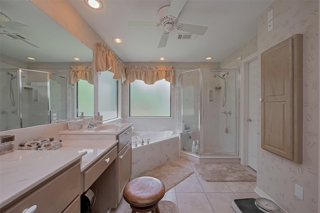 bathroom featuring visible vents, vanity, ceiling fan, and a stall shower