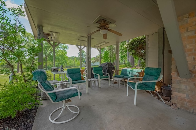 view of patio with outdoor lounge area and ceiling fan