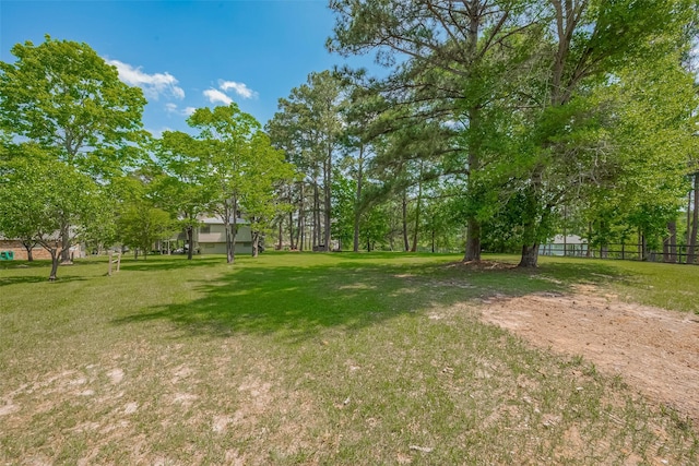 view of yard with fence