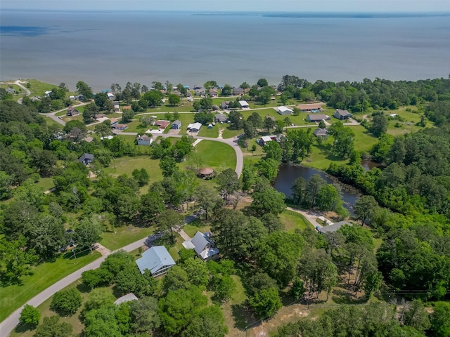 drone / aerial view featuring a water view and a residential view