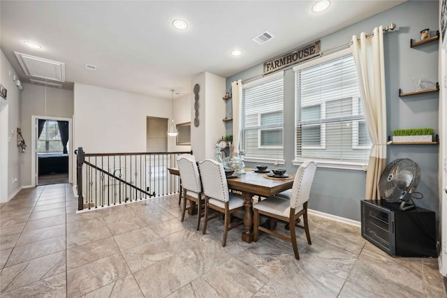 dining room featuring attic access, baseboards, visible vents, and recessed lighting