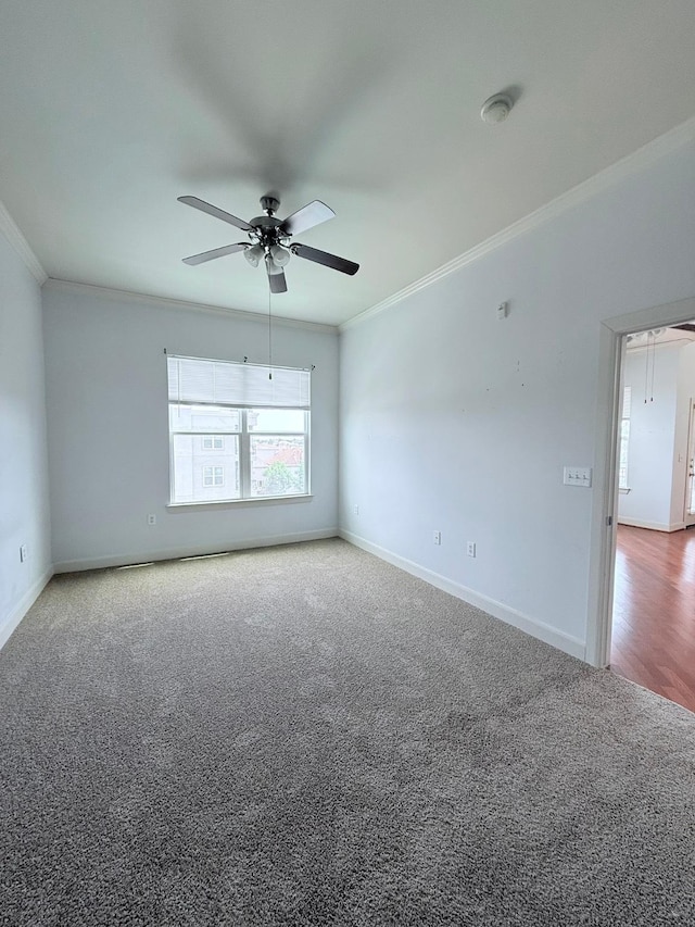 1010 Rosine St Unit 49, Houston, TX 77019 - carpeted spare room with ornamental molding, a ceiling fan, baseboards, and attic access