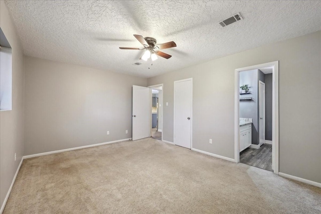 1117 Meadowland Dr, Beaumont, TX 77706 - unfurnished bedroom with visible vents, baseboards, and light carpet