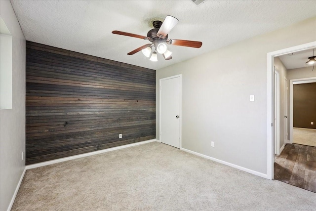1117 Meadowland Dr, Beaumont, TX 77706 - spare room with attic access, carpet, a ceiling fan, and baseboards