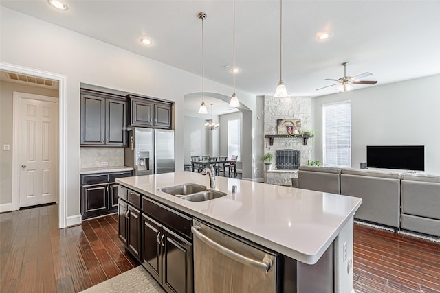kitchen with light countertops, visible vents, a sink, and appliances with stainless steel finishes