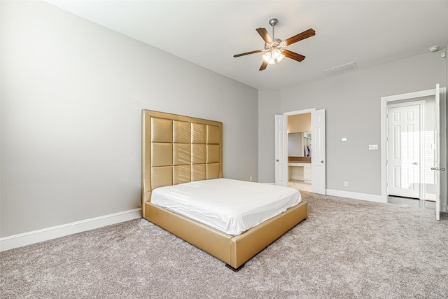 bedroom featuring visible vents, ceiling fan, baseboards, and light colored carpet