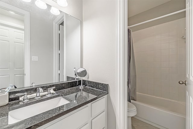 full bath featuring tile patterned flooring, shower / tub combo with curtain, toilet, and vanity