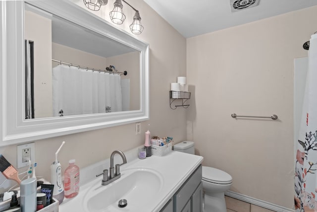 bathroom featuring toilet, visible vents, tile patterned flooring, a shower with shower curtain, and vanity