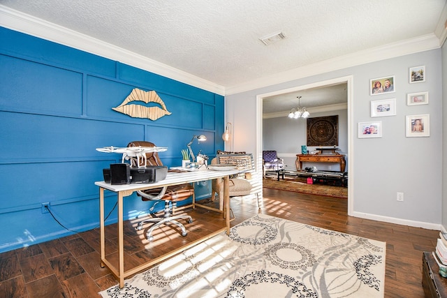 office with wood finished floors, visible vents, crown molding, and an inviting chandelier
