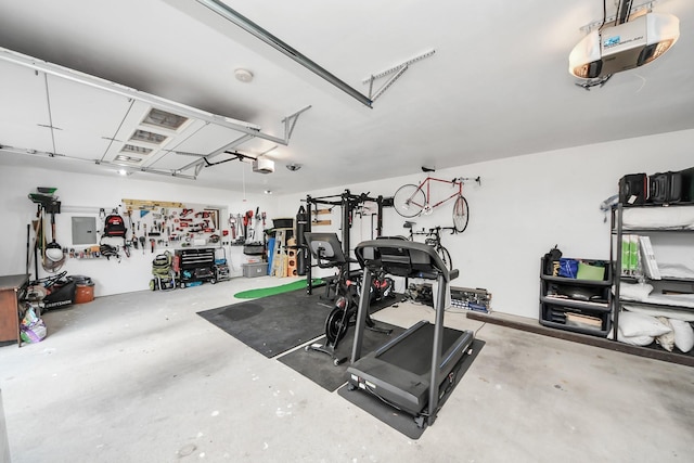 1561 Scharpe St, Houston, TX 77023 - interior space with electric panel, a workshop area, and a garage