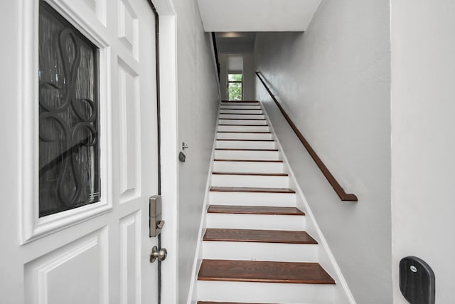1561 Scharpe St, Houston, TX 77023 - staircase featuring baseboards