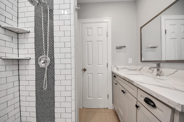1561 Scharpe St, Houston, TX 77023 - bathroom featuring vanity, tile patterned floors, and tiled shower