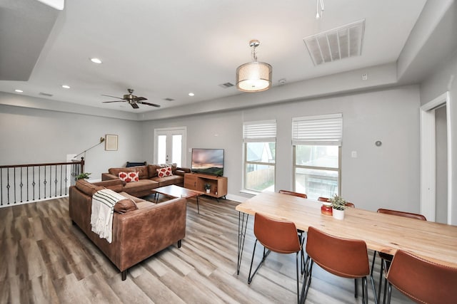 1561 Scharpe St, Houston, TX 77023 - living area with wood finished floors, visible vents, recessed lighting, and ceiling fan