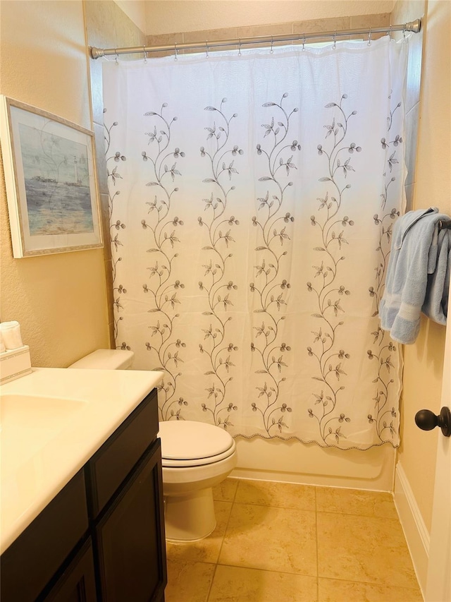 full bath with tile patterned floors, toilet, vanity, and shower / bath combination with curtain