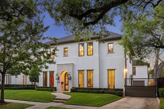 2926 Wroxton Rd, West University Place, TX 77005 - french provincial home featuring stucco siding and driveway
