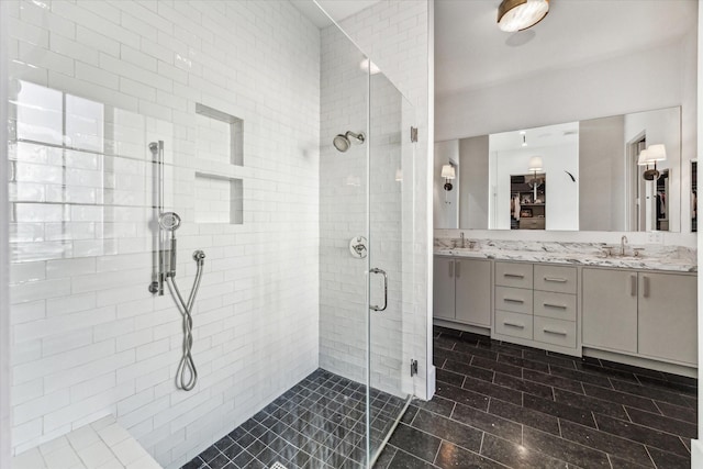 2926 Wroxton Rd, West University Place, TX 77005 - full bathroom featuring a stall shower and double vanity