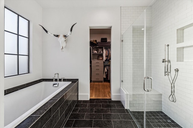 2926 Wroxton Rd, West University Place, TX 77005 - full bath with a bath, a shower stall, a walk in closet, and tile patterned floors