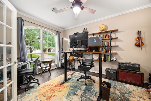 office with a ceiling fan, baseboards, wood finished floors, visible vents, and ornamental molding