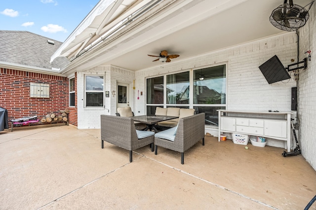 view of patio featuring a ceiling fan and outdoor dining space