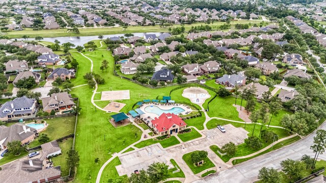aerial view with a residential view and a water view