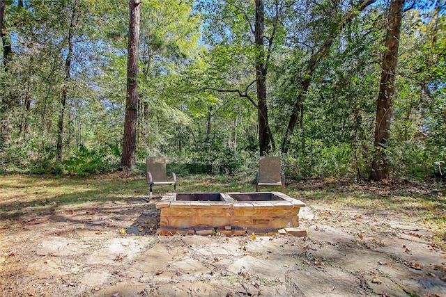 310 Karen Dr, Lufkin, TX 75901 - view of yard with an outdoor fire pit