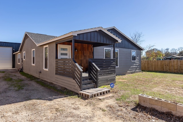 19014 Frederick Dr, Tomball, TX 77377 - view of front of house with fence and board and batten siding