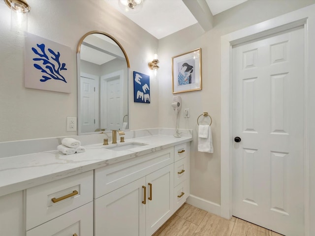 1002 Staples Ave, Seabrook, TX 77586 - bathroom with vanity and baseboards