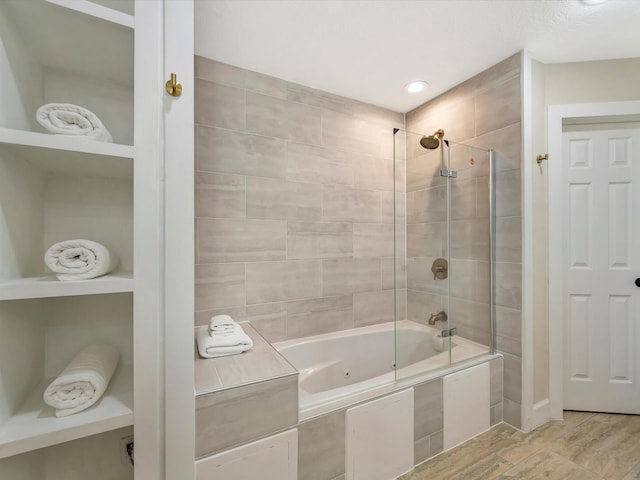1002 Staples Ave, Seabrook, TX 77586 - full bath featuring a combined bath / shower with jetted tub and recessed lighting