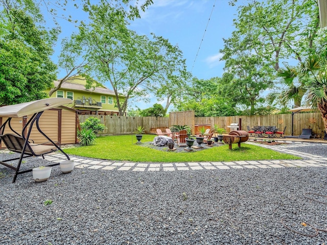 1002 Staples Ave, Seabrook, TX 77586 - view of yard featuring a patio and a fire pit