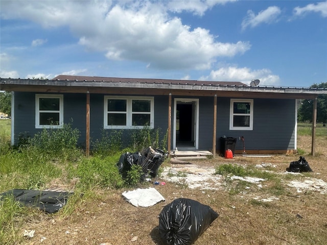 view of front of property featuring metal roof