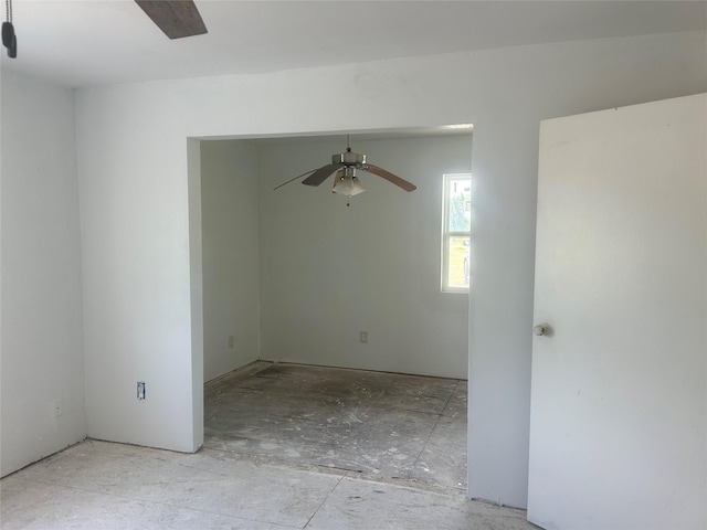 spare room with a ceiling fan