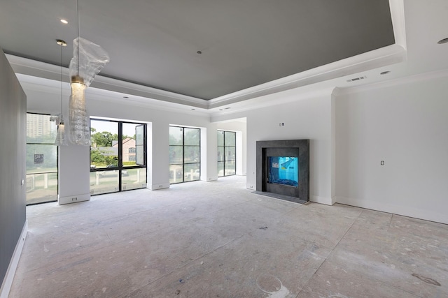5517 Sturbridge Dr, Houston, TX 77056 - unfurnished living room featuring a raised ceiling, ornamental molding, a premium fireplace, and baseboards