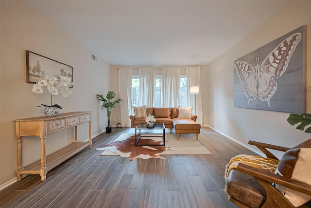 859 Wax Myrtle Ln, Houston, TX 77079 - living area featuring baseboards, visible vents, and dark wood finished floors