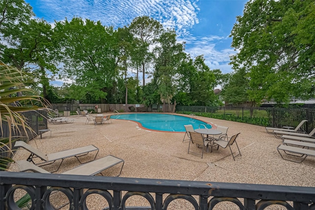 859 Wax Myrtle Ln, Houston, TX 77079 - community pool featuring a patio area and fence